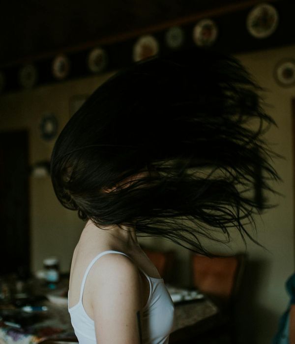 Person in mid-motion, blurred slightly to convey fluidity and energy.